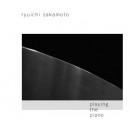 RYUICHI sakamoto -playing the piano